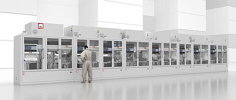 Frontansicht auf Life Sciene Final Assembly Linie. Ein Mann steht an einer Maschine
